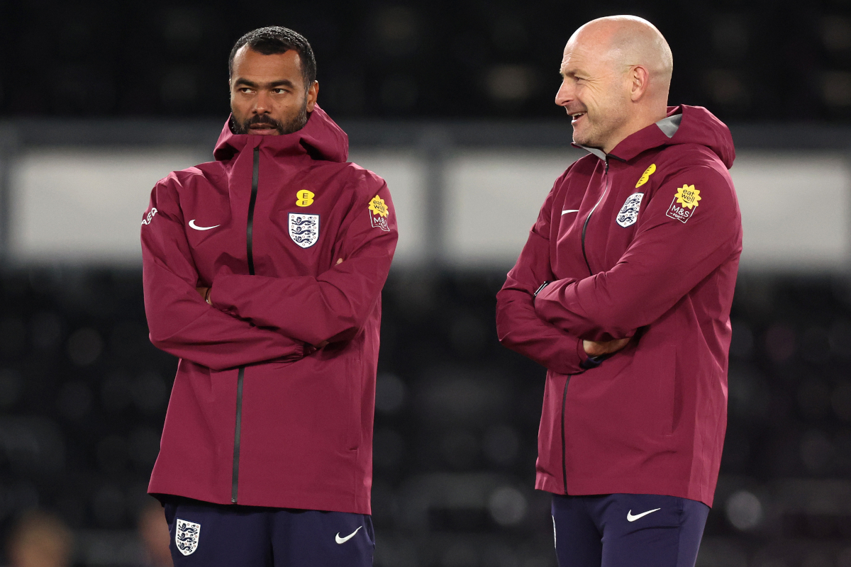 DERBY, ENGLAND - OCTOBER 13: Ashley Cole, Assistant Head Coach of England, and Lee Carsley, Head Coach of England, looks on prior to the 2027 UEFA European Under-21 Championship Qualifier match between England and Andorra at Pride Park on October 13, 2025 in Derby, England. (Photo by Nathan Stirk/Getty Images)