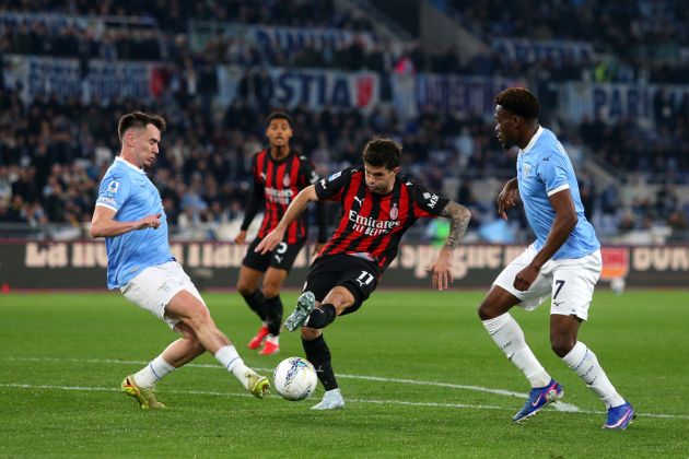 ROME, ITALY - MARCH 15: Christian Pulisic of AC Milan shoots whilst under pressure from Patric and Fisayo Dele-Bashiru of Lazio during the Serie A match between SS Lazio and AC Milan at Stadio Olimpico on March 15, 2026 in Rome, Italy. (Photo by Paolo Bruno/Getty Images)