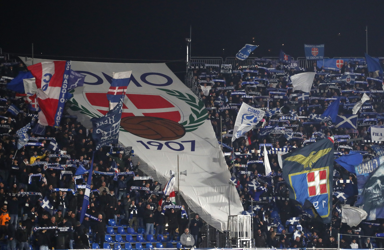 COMO, ITALY - MARCH 03: The Como 1907 fans show their support during the Coppa Italia match between Como 1907 and FC Internazionale at Giuseppe Sinigaglia Stadium on March 03, 2026 in Como, Italy. (Photo by Marco Luzzani/Getty Images)
