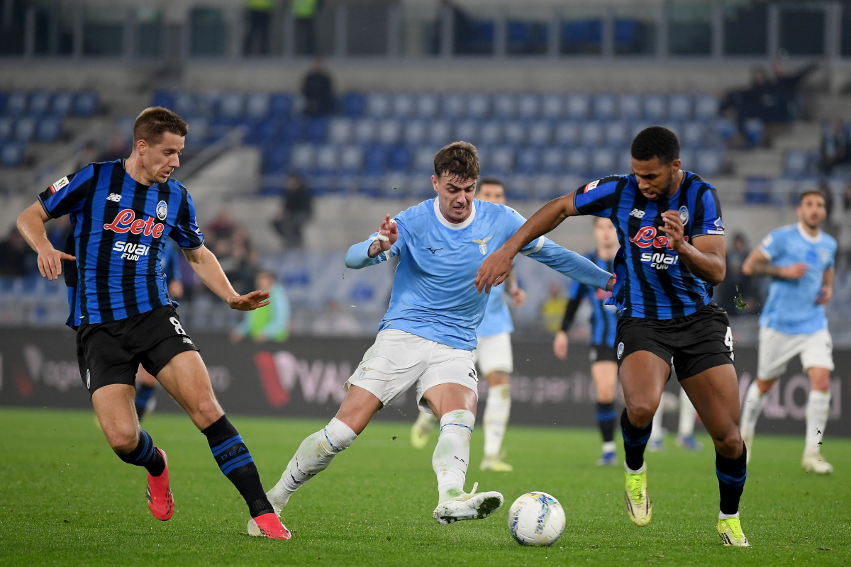 ROME, ITALY - MARCH 04:Daniel Maldini of SS Lazio competes for the ball with Mario Pasalic and Isak Hien of Atalanta BG during the Coppa Italia match between SS Lazio and Atalanta BC at Olimpico Stadium on March 04, 2026 in Rome, Italy. (Photo by Marco Rosi - SS Lazio/Getty Images)