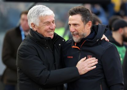 ROME, ITALY - MARCH 22: Gian Piero Gasperini, Head Coach of AS Roma, and Eusebio Di Francesco, Head Coach of US Lecce, embrace prior to the Serie A match between AS Roma and US Lecce at Stadio Olimpico on March 22, 2026 in Rome, Italy. (Photo by Linnea Rheborg/Getty Images)