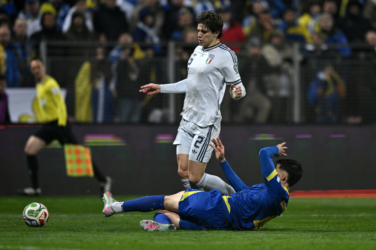 ZENICA, BOSNIA AND HERZEGOVINA - MARCH 31: Tarik Muharemovic of Bosnia & Herzegovina competes for the ball with Marco Palestra of Italy during the FIFA World Cup 2026 European Qualifiers KO play-offs match between Bosnia and Herzegovina and Italy at Stadion Bilino Polje on March 31, 2026 in Zenica, Bosnia and Herzegovina. (Photo by Getty Images/Getty Images)