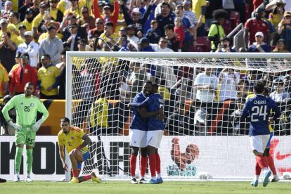 LANDOVER, MARYLAND - MARCH 29: Marcus Thuram of France celebrates scoring his team's second goal with teammate Pierre Kalulu during the international friendly match between Colombia and France at Northwest Stadium on March 29, 2026 in Landover, Maryland. (Photo by Hannah Foslien/Getty Images)