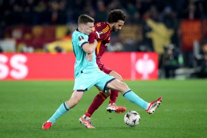 ROME, ITALY - MARCH 19: Mario Hermoso of AS Roma is challenged by Lewis Ferguson of Bologna during the UEFA Europa League 2025/26 Round of 16 Second Leg match between AS Roma and Bologna FC 1909 at Stadio Olimpico on March 19, 2026 in Rome, Italy. (Photo by Paolo Bruno/Getty Images)