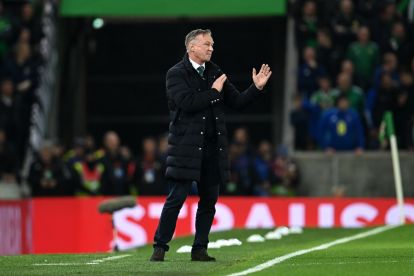 BELFAST, NORTHERN IRELAND - OCTOBER 13: Michael O'Neill, Head Coach of Northern Ireland, gestures during the FIFA World Cup 2026 qualifier match between Northern Ireland and Germany at Windsor Park on October 13, 2025 in Belfast, Northern Ireland. (Photo by Charles McQuillan/Getty Images)