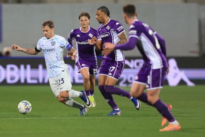 FLORENCE, ITALY - MARCH 22: Nicolo' Barella of FC Internazionale in action with Cher Ndour during the Serie A match between ACF Fiorentina and FC Internazionale at Artemio Franchi on March 22, 2026 in Florence, Italy. (Photo by Gabriele Maltinti/Getty Images)