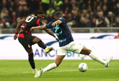 MILAN, ITALY - MARCH 08: Rafael Leao of AC Milan kicks a ball whilst under pressure from Manuel Akanji of Inter during the Serie A match between AC Milan and FC Internazionale at Giuseppe Meazza Stadium on March 08, 2026 in Milan, Italy. (Photo by Marco Luzzani/Getty Images)