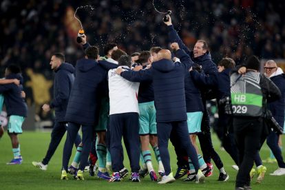 ROME, ITALY - MARCH 19: Players of Bologna celebrate after the team's victory in the UEFA Europa League 2025/26 Round of 16 Second Leg match between AS Roma and Bologna FC 1909 at Stadio Olimpico on March 19, 2026 in Rome, Italy. (Photo by Paolo Bruno/Getty Images)