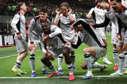 MILAN, ITALY - MARCH 21: Youssouf Fofana of AC Milan celebrates scoring his team's third goal with teammates during the Serie A match between AC Milan and Torino FC at Giuseppe Meazza Stadium on March 21, 2026 in Milan, Italy. (Photo by Marco Luzzani/Getty Images)