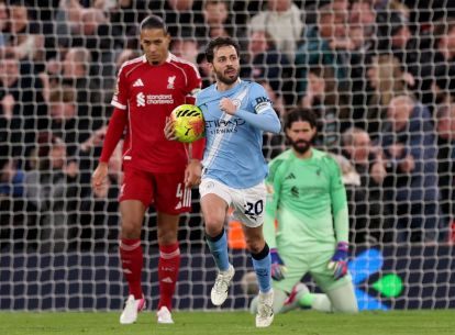 LIVERPOOL, ENGLAND - FEBRUARY 08: Bernardo Silva of Manchester City celebrates scoring his team's first goal during the Premier League match between Liverpool and Manchester City at Anfield on February 08, 2026 in Liverpool, England. (Photo by Carl Recine/Getty Images)