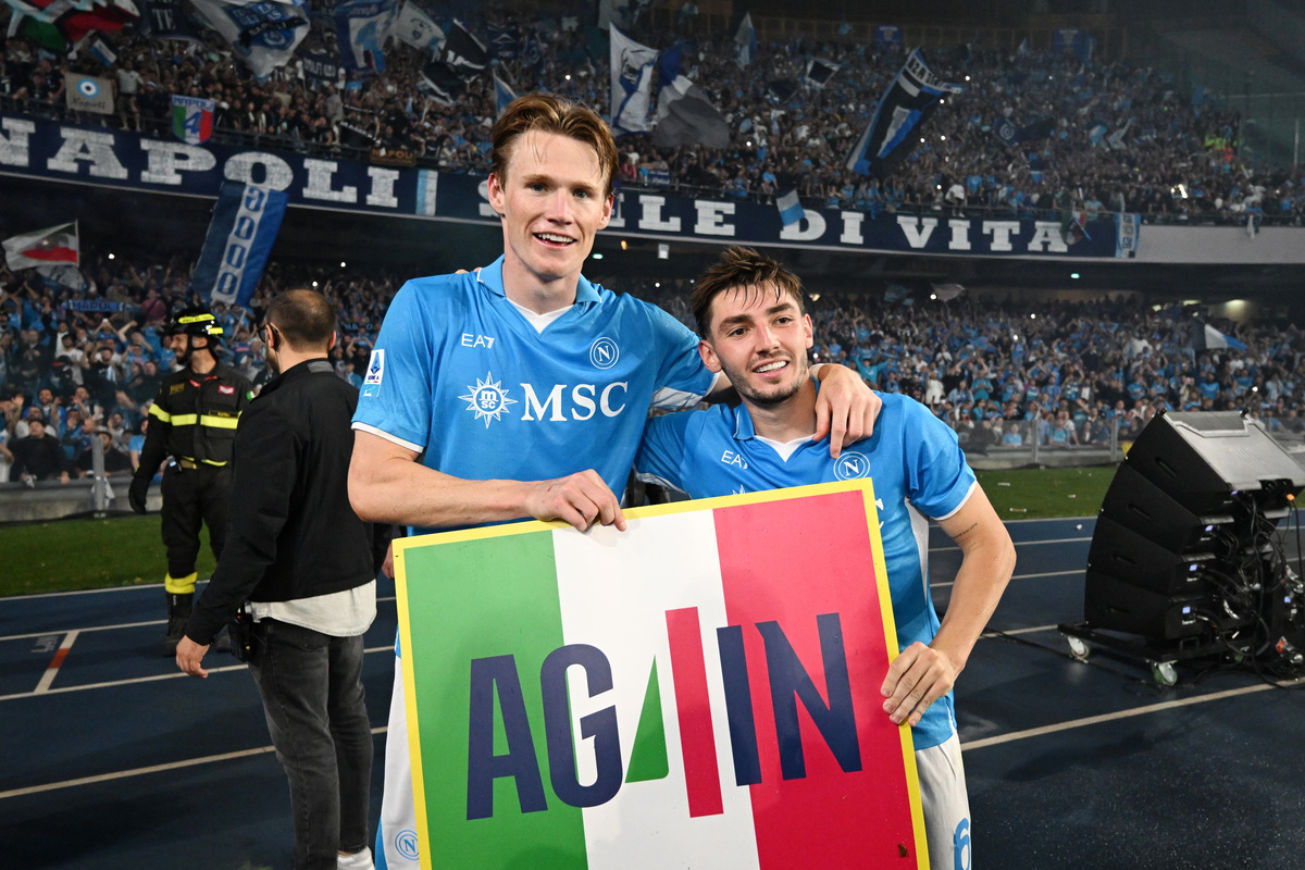 NAPLES, ITALY - MAY 23: Scott McTominay of Napoli poses for a photo as he celebrates victory with teammate Billy Gilmour following the Serie A match between Napoli and Cagliari at Stadio Diego Armando Maradona on May 23, 2025 in Naples, Italy. (Photo by Francesco Pecoraro/Getty Images)
