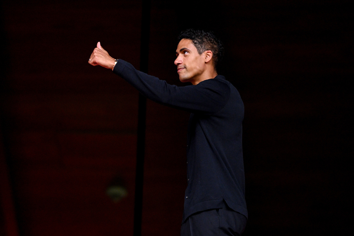 BILBAO, SPAIN - MAY 21: Raphael Varane, former Manchester United player, greets fans in the stadium prior to the UEFA Europa League Final 2025 between Tottenham Hotspur and Manchester United at Estadio de San Mames on May 21, 2025 in Bilbao, Spain. (Photo by Justin Setterfield/Getty Images)