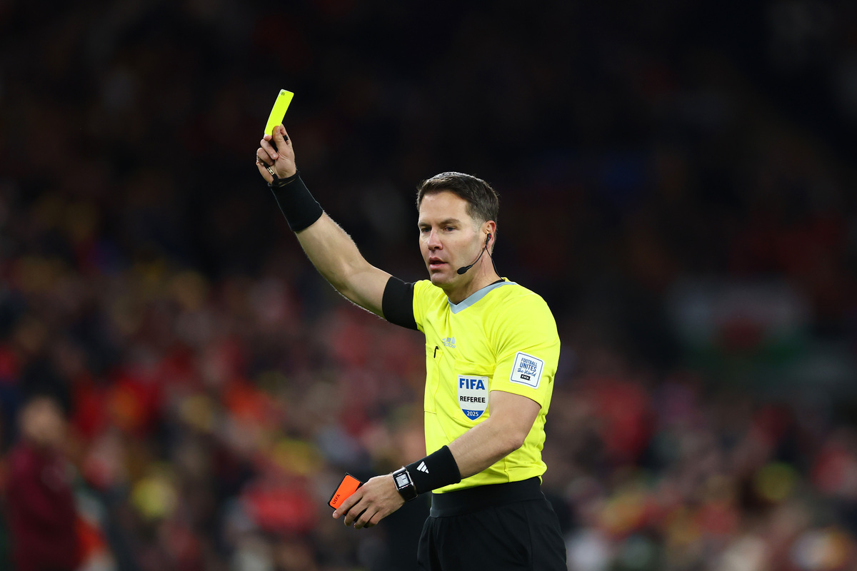 CARDIFF, WALES - NOVEMBER 18: Referee Danny Makkelie shows a yellow card during the FIFA World Cup 2026 qualifier match between Wales and North Macedonia at Cardiff City Stadium on November 18, 2025 in Cardiff, Wales. (Photo by Dan Istitene/Getty Images) (Referee for Italy vs. Northern Ireland)