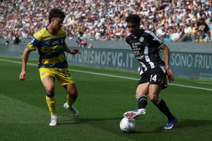 UDINE, ITALY - APRIL 18: Arthur Atta of Udinese and Alessandro Circati of Parma in action during the Serie A match between Udinese Calcio and Parma Calcio 1913 at Stadio Friuli on April 18, 2026 in Udine, Italy. (Photo by Timothy Rogers/Getty Images)