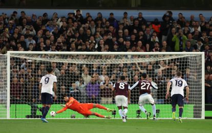 BIRMINGHAM, ENGLAND - APRIL 16: Federico Ravaglia of Bologna saves a penalty from Morgan Rogers of Aston Villa during the UEFA Europa League 2025/26 Quarter-Final Leg Two match between Aston Villa FC and Bologna FC 1909 at Villa Park on April 16, 2026 in Birmingham, England. (Photo by Dan Mullan/Getty Images)