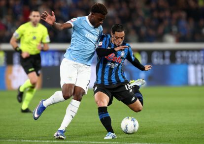 BERGAMO, ITALY - APRIL 22: Giacomo Raspadori of Atalanta is challenged by Fisayo Dele-Bashiru of Lazio during the Coppa Italia semifinal match between Atalanta BC and SS Lazio at New Balance Arena on April 22, 2026 in Bergamo, Italy. (Photo by Marco Luzzani/Getty Images)