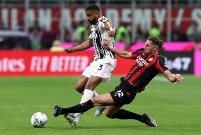MILAN, ITALY - APRIL 26: Bremer of Juventus is challenged by Adrien Rabiot of AC Milan during the Serie A match between AC Milan and Juventus FC at Giuseppe Meazza Stadium on April 26, 2026 in Milan, Italy. (Photo by Marco Luzzani/Getty Images)
