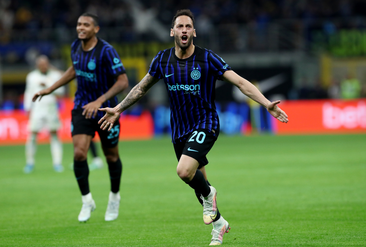 MILAN, ITALY - APRIL 05: Hakan Calhanoglu of Inter celebrates scoring his team's second goal during the Serie A match between FC Internazionale and AS Roma at Giuseppe Meazza Stadium on April 05, 2026 in Milan, Italy. (Photo by Marco Luzzani/Getty Images)