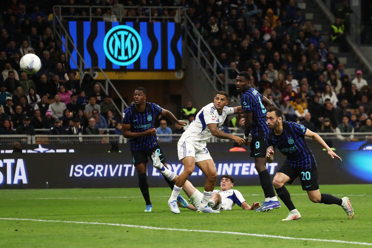 MILAN, ITALY - APRIL 21: Hakan Calhanoglu of FC Internazionale Milano scores his team's second goal during the Coppa Italia Semi-Final match between FC Internazionale and Como at San Siro on April 21, 2026 in Milan, Italy. (Photo by Marco Luzzani/Getty Images)