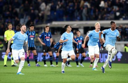 BERGAMO, ITALY - APRIL 22: Tijjani Noslin and Manuel Lazzari of Lazio celebrate with teammates during the penalty shoot out in the Coppa Italia semifinal match between Atalanta BC and SS Lazio at New Balance Arena on April 22, 2026 in Bergamo, Italy. (Photo by Marco Luzzani/Getty Images)