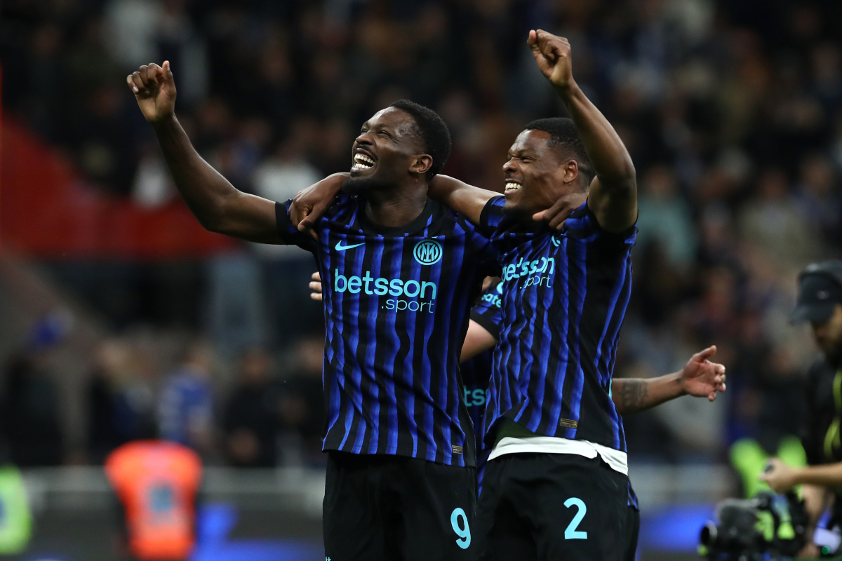 MILAN, ITALY - APRIL 21: Marcus Thuram and Denzel Dumfries of FC Internazionale Milano celebrate after the Coppa Italia Semi-Final match between FC Internazionale and Como at San Siro on April 21, 2026 in Milan, Italy. (Photo by Marco Luzzani/Getty Images)