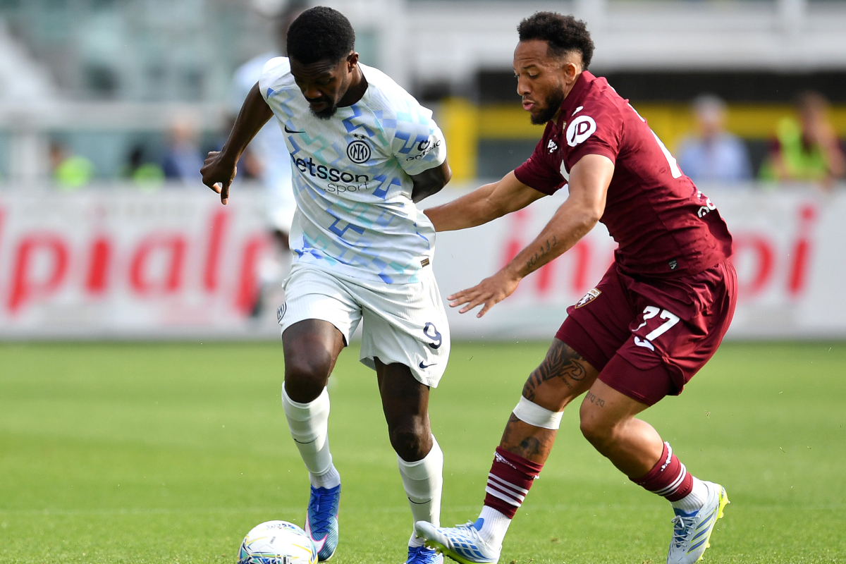 TURIN, ITALY - APRIL 26: Marcus Thuram of FC Internazionale Milano is challenged by Enzo Ebosse of Torino during the Serie A match between Torino FC and FC Internazionale at Stadio Olimpico di Torino on April 26, 2026 in Turin, Italy. (Photo by Valerio Pennicino/Getty Images)