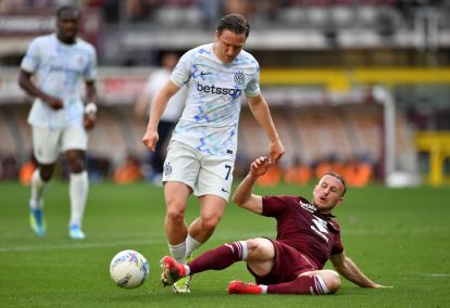 TURIN, ITALY - APRIL 26: Piotr Zielinski of FC Internazionale Milano is challenged by Ardian Ismajli of Torino during the Serie A match between Torino FC and FC Internazionale at Stadio Olimpico di Torino on April 26, 2026 in Turin, Italy. (Photo by Valerio Pennicino/Getty Images)