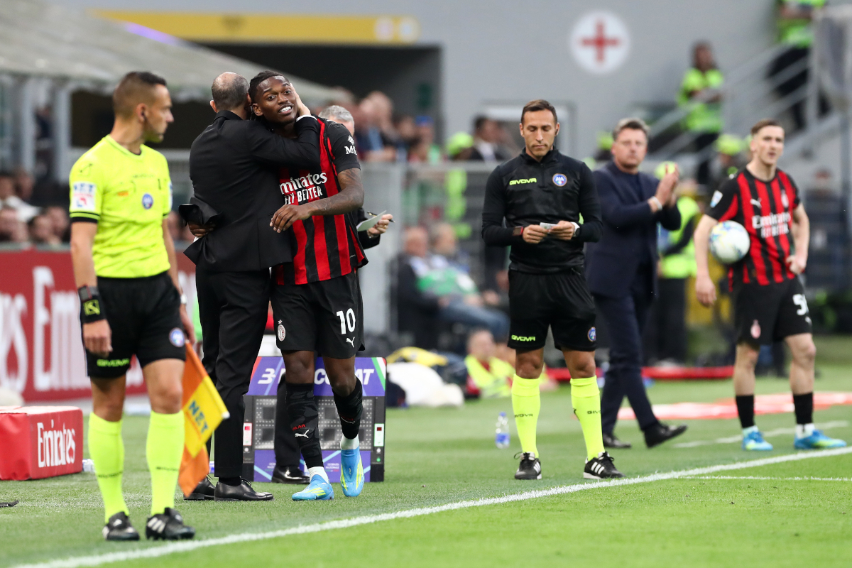 MILAN, ITALY - APRIL 11: Rafael Leao of AC Milan is hugged by Massimiliano Allegri, Head Coach of AC Milan, after being substituted during the Serie A match between AC Milan and Udinese Calcio at Giuseppe Meazza Stadium on April 11, 2026 in Milan, Italy. (Photo by Marco Luzzani/Getty Images)