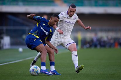VERONA, ITALY - APRIL 04: Rafik Belghali of Hellas Verona competes for the ball with Jack Harrison of Fiorentina during the Serie A match between Hellas Verona FC and ACF Fiorentina at Stadio Marcantonio Bentegodi on April 04, 2026 in Verona, Italy. (Photo by Emmanuele Ciancaglini/Getty Images)