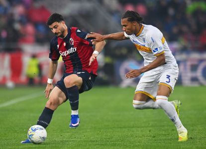 BOLOGNA, ITALY - APRIL 12: Riccardo Orsolini of Bologna is challenged by Corrie Ndaba of US Lecce during the Serie A match between Bologna FC 1909 and US Lecce at Renato Dall'Ara Stadium on April 12, 2026 in Bologna, Italy. (Photo by Alessandro Sabattini/Getty Images)