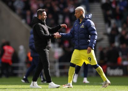 SUNDERLAND, ENGLAND - APRIL 12: Roberto De Zerbi, Manager of Tottenham Hotspur, shakes hands with Richarlison after the Premier League match between Sunderland and Tottenham Hotspur at Stadium of Light on April 12, 2026 in Sunderland, England. (Photo by Stu Forster/Getty Images)