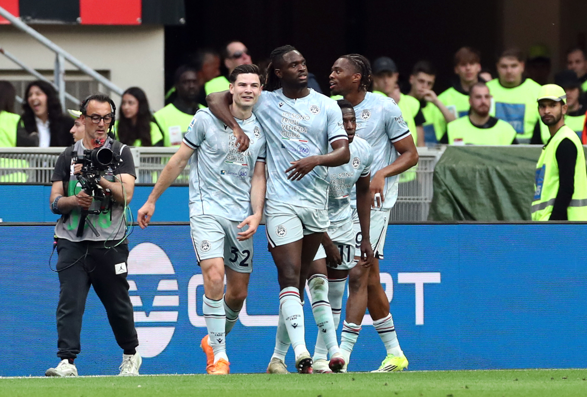 MILAN, ITALY - APRIL 11: Jurgen Ekkelenkamp of Udinese Calcio celebrates scoring his team's second goal with teammates during the Serie A match between AC Milan and Udinese Calcio at Giuseppe Meazza Stadium on April 11, 2026 in Milan, Italy. (Photo by Marco Luzzani/Getty Images)