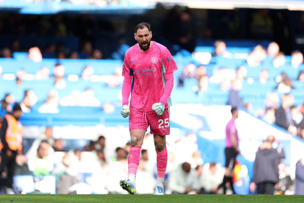 LONDON, ENGLAND - APRIL 12: Gianluigi Donnarumma of Manchester City celebrates his side's first goal scored by Nico O'Reilly of Manchester City (not pictured) during the Premier League match between Chelsea and Manchester City at Stamford Bridge on April 12, 2026 in London, England. (Photo by Justin Setterfield/Getty Images)