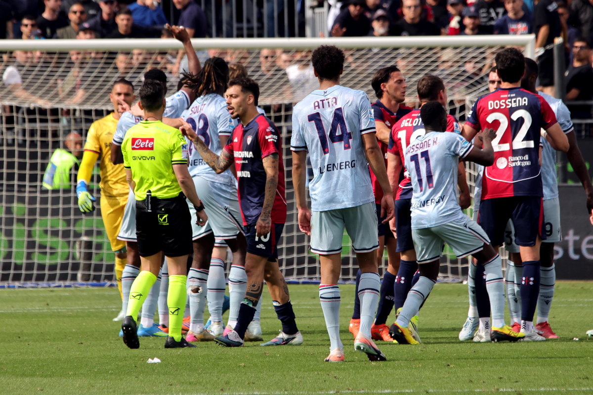 CAGLIARI, ITALY - MAY 09: Keinan Davis and Alberto Dossena tension, reactions on the pitch between the two teams at the end of the match during the Serie A match between Cagliari Calcio and Udinese Calcio at Stadio Sant'Elia on May 09, 2026 in Cagliari, Italy. (Photo by Enrico Locci/Getty Images)