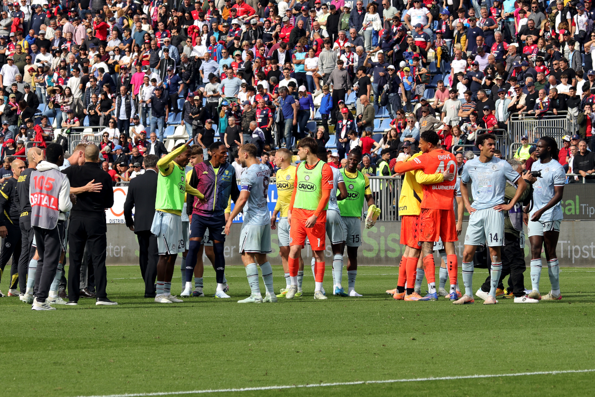 CAGLIARI, ITALY - MAY 09: reactions on the pitch between the two teams at the end of the match during the Serie A match between Cagliari Calcio and Udinese Calcio at Stadio Sant'Elia on May 09, 2026 in Cagliari, Italy. (Photo by Enrico Locci/Getty Images)