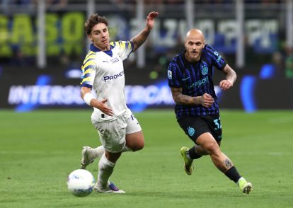 MILAN, ITALY - MAY 03: Federico Dimarco of FC Internazionale Milano and Adrian Bernabe of Parma Calcio 1913 chase after the ball during the Serie A match between FC Internazionale and Parma Calcio 1913 at Giuseppe Meazza Stadium on May 03, 2026 in Milan, Italy. (Photo by Marco Luzzani/Getty Images)