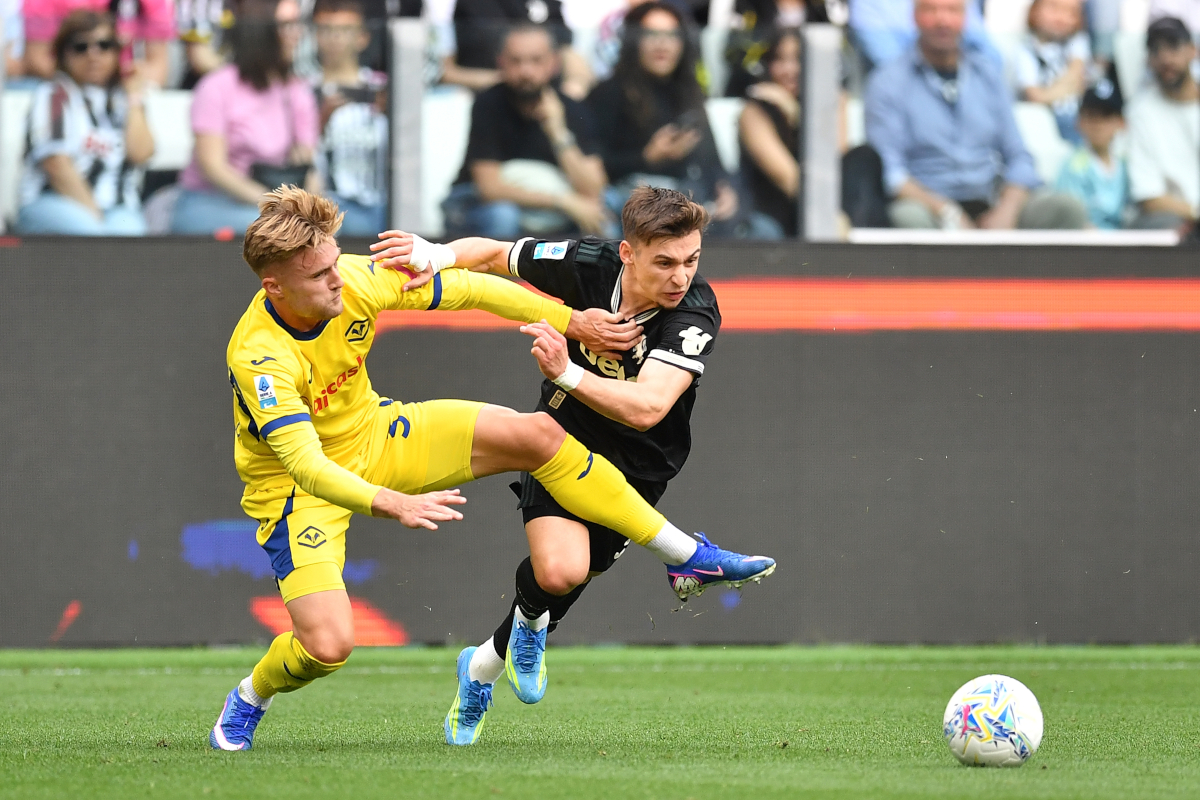 TURIN, ITALY - MAY 03: Francisco Conceicao of Juventus FC is tackled by Martin Frese of Hellas Verona FC during the Serie A match between Juventus FC and Hellas Verona FC at Allianz Stadium on May 3, 2026 in Turin, Italy. (Photo by Valerio Pennicino/Getty Images)