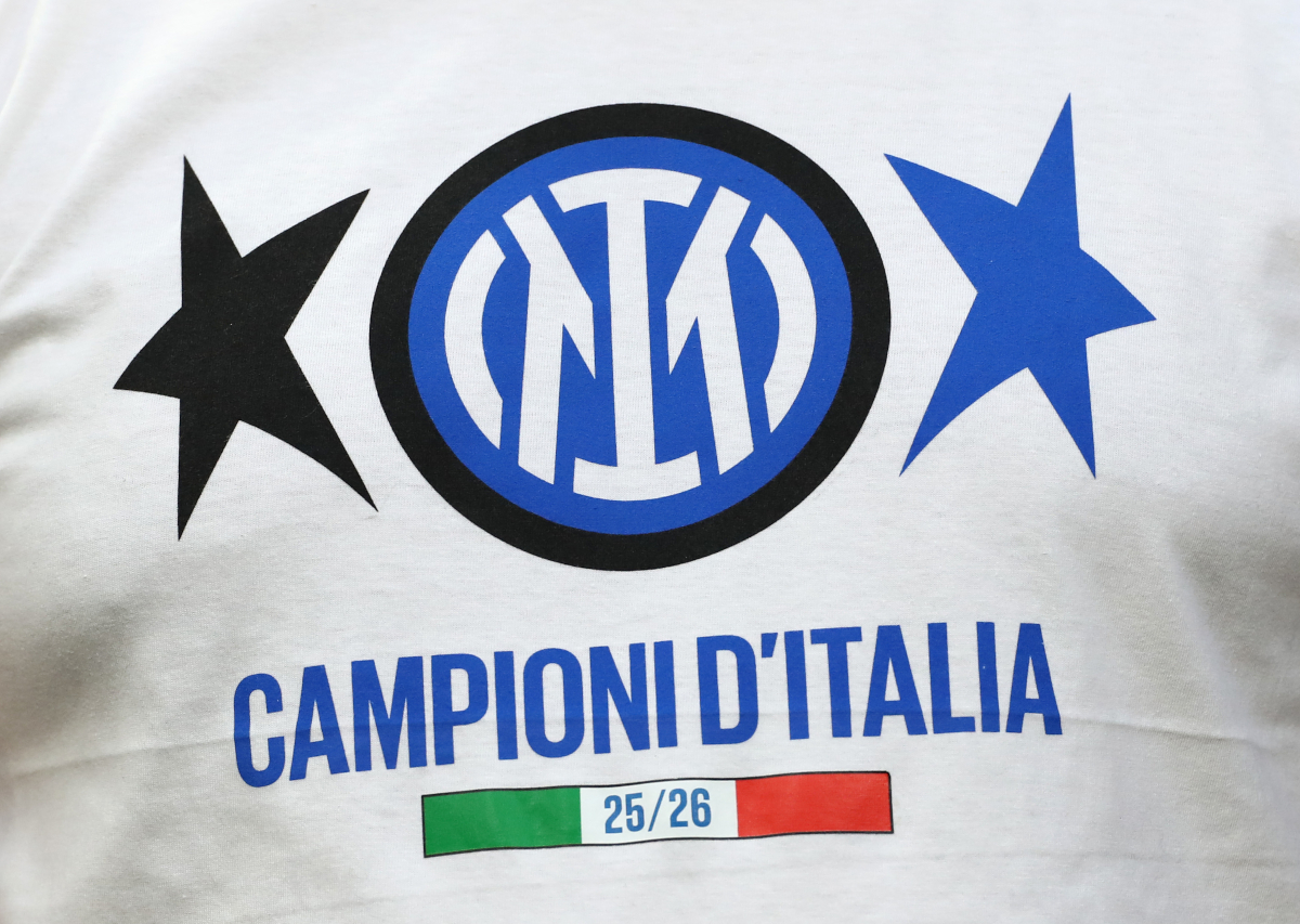 MILAN, ITALY - MAY 03: A fan of FC Internazionale Milano wears a Champions of Italy 25/26 shirt at the Serie A match between FC Internazionale and Parma Calcio 1913 at Giuseppe Meazza Stadium on May 03, 2026 in Milan, Italy. (Photo by Marco Luzzani/Getty Images)