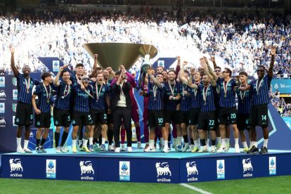MILAN, ITALY - MAY 17: Lautaro Martinez of FC Internazionale Milano lifts the Coppa Campioni d'Italia trophy following the Serie A match between FC Internazionale and Hellas Verona FC at Giuseppe Meazza Stadium on May 17, 2026 in Milan, Italy. (Photo by Marco Luzzani/Getty Images)