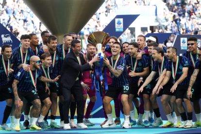 MILAN, ITALY - MAY 17: Lautaro Martinez of FC Internazionale Milano lifts the Coppa Campioni d'Italia trophy following the Serie A match between FC Internazionale and Hellas Verona FC at Giuseppe Meazza Stadium on May 17, 2026 in Milan, Italy. (Photo by Marco Luzzani/Getty Images)