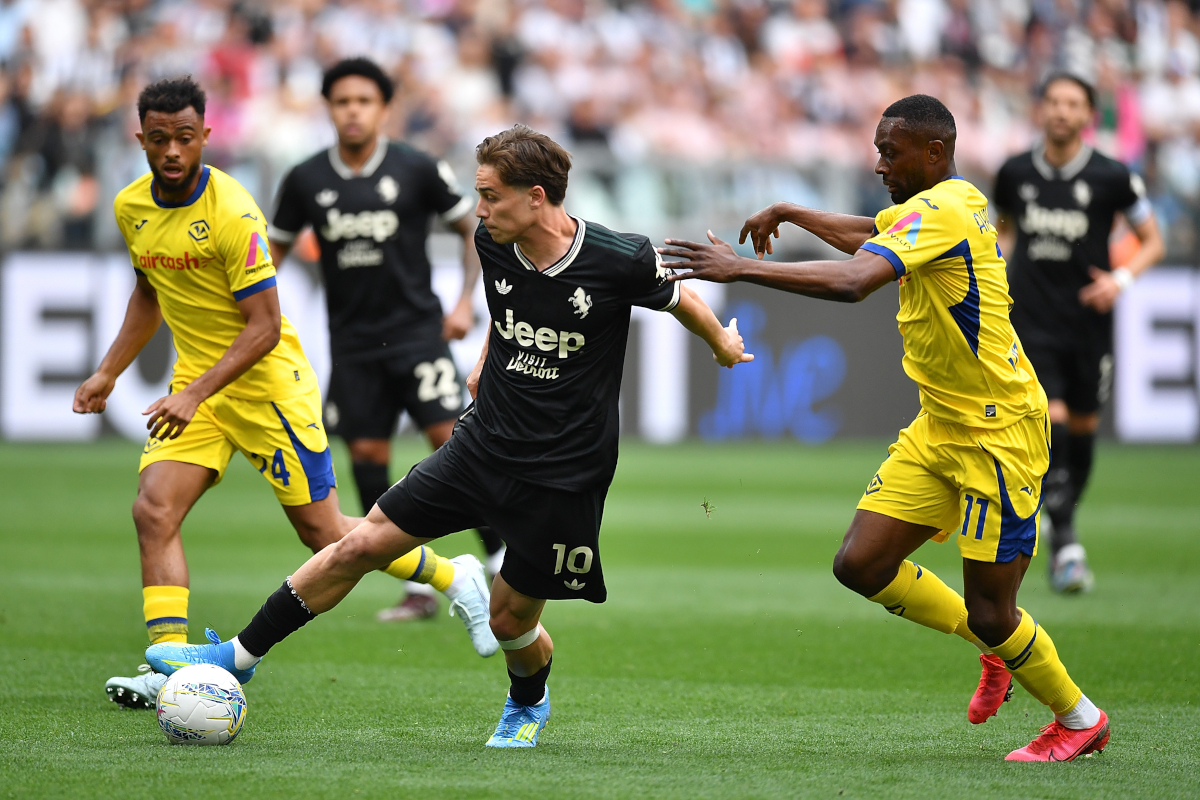 TURIN, ITALY - MAY 03: Kenan Yildiz of Juventus FC is challenged by Jean-Daniel Dave Lewis Akpa Akpro of Hellas Verona FC during the Serie A match between Juventus FC and Hellas Verona FC at Allianz Stadium on May 3, 2026 in Turin, Italy. (Photo by Valerio Pennicino/Getty Images)
