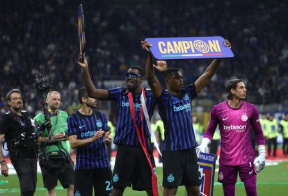 MILAN, ITALY - MAY 03: Marcus Thuram and Denzel Dumfries of FC Internazionale Milano celebrate after being confirmed as Serie A champions following victory in the Serie A match between FC Internazionale and Parma Calcio 1913 at Giuseppe Meazza Stadium on May 03, 2026 in Milan, Italy. (Photo by Marco Luzzani/Getty Images)