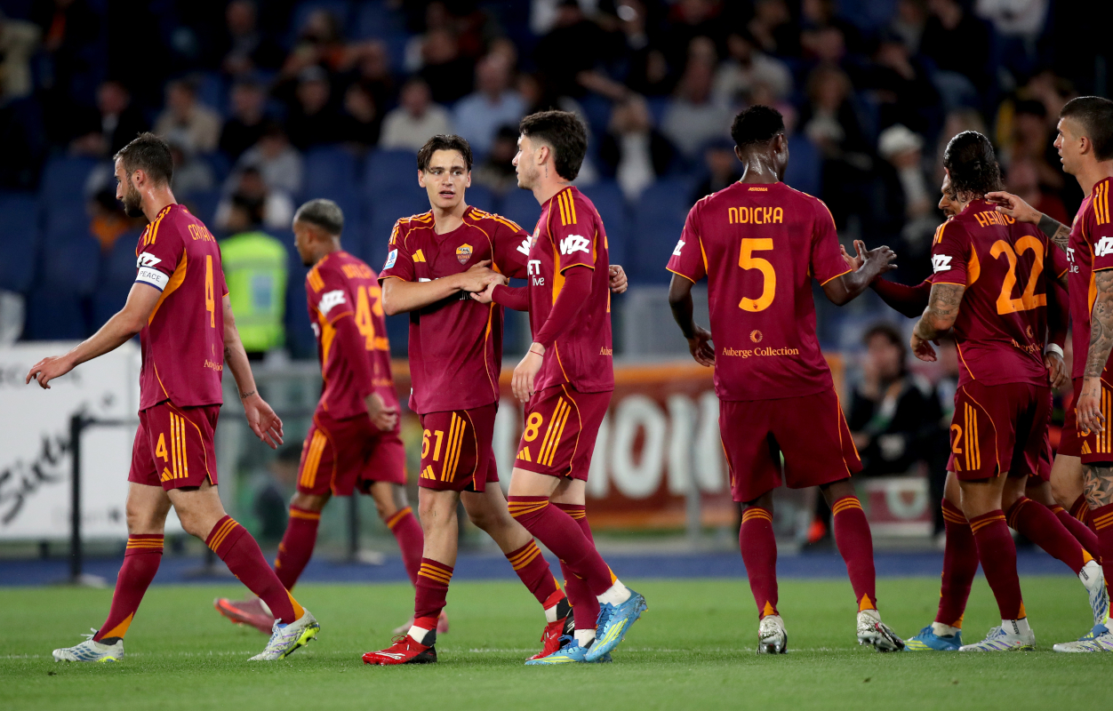 ROME, ITALY - MAY 04: Niccolo Pisilli of AS Roma celebrates scoring his team's fourth goal with teammate Matias Soule during the Serie A match between AS Roma and ACF Fiorentina at Stadio Olimpico on May 04, 2026 in Rome, Italy. (Photo by Paolo Bruno/Getty Images)