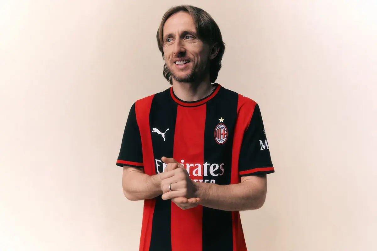Luka Modric modelling the new AC Milan kit for 2025-26 season.