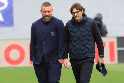 FLORENCE, ITALY - MAY 10: Daniele De Rossi, Manager of Genoa CFC, and Head coach Paolo Vanoli manager of ACF Fiorentina react during the Serie A match between ACF Fiorentina and Genoa CFC at Artemio Franchi on May 10, 2026 in Florence, Italy. (Photo by Gabriele Maltinti/Getty Images)