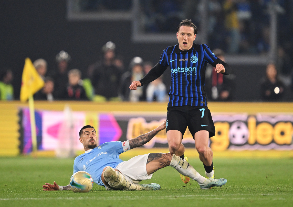 ROME, ITALY - MAY 13: Piotr Zielinski of FC Internazionale Milano is challenged by Mattia Zaccagni of Lazio during the Coppa Italia Final match between SS Lazio and FC Internazionale at Stadio Olimpico on May 13, 2026 in Rome, Italy. (Photo by Tullio M. Puglia/Getty Images)