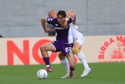 FLORENCE, ITALY - MAY 10: Riccardo Braschi of ACF Fiorentina in action against Leo Ostigard of Genoa CFC during the Serie A match between ACF Fiorentina and Genoa CFC at Artemio Franchi on May 10, 2026 in Florence, Italy. (Photo by Gabriele Maltinti/Getty Images)