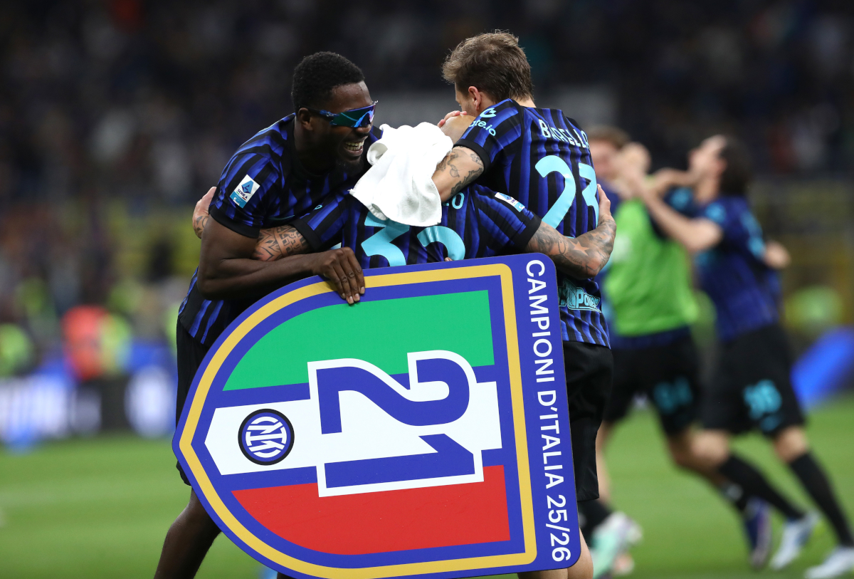 MILAN, ITALY - MAY 03: Marcus Thuram, Federico Dimarco, and Nicolo Barella of FC Internazionale Milano celebrate after being confirmed as Serie A champions following victory in the Serie A match between FC Internazionale and Parma Calcio 1913 at Giuseppe Meazza Stadium on May 03, 2026 in Milan, Italy. (Photo by Marco Luzzani/Getty Images)