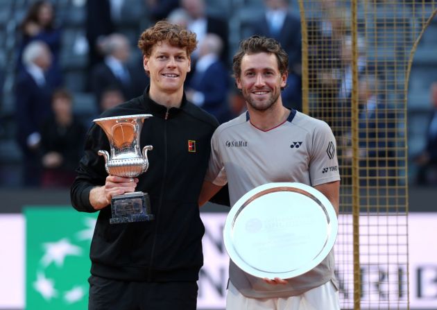 ROME, ITALY - MAY 17: Winner Jannik Sinner of Italy and runner up Casper Ruud of Norway pose for a photo with their trophies following the Men's Singles Final match on Day Thirteen of the Internazionali BNL D'Italia 2026 at Foro Italico on May 17, 2026 in Rome, Italy. (Photo by Clive Brunskill/Getty Images)