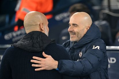 MANCHESTER, ENGLAND - JANUARY 25: Enzo Maresca, Manager of Chelsea, embraces Pep Guardiola, Manager of Manchester City, prior to the Premier League match between Manchester City FC and Chelsea FC at Etihad Stadium on January 25, 2025 in Manchester, England. (Photo by Michael Regan/Getty Images)